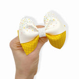 SPRINKLE BOW FAUX LEATHER CUTOUTS