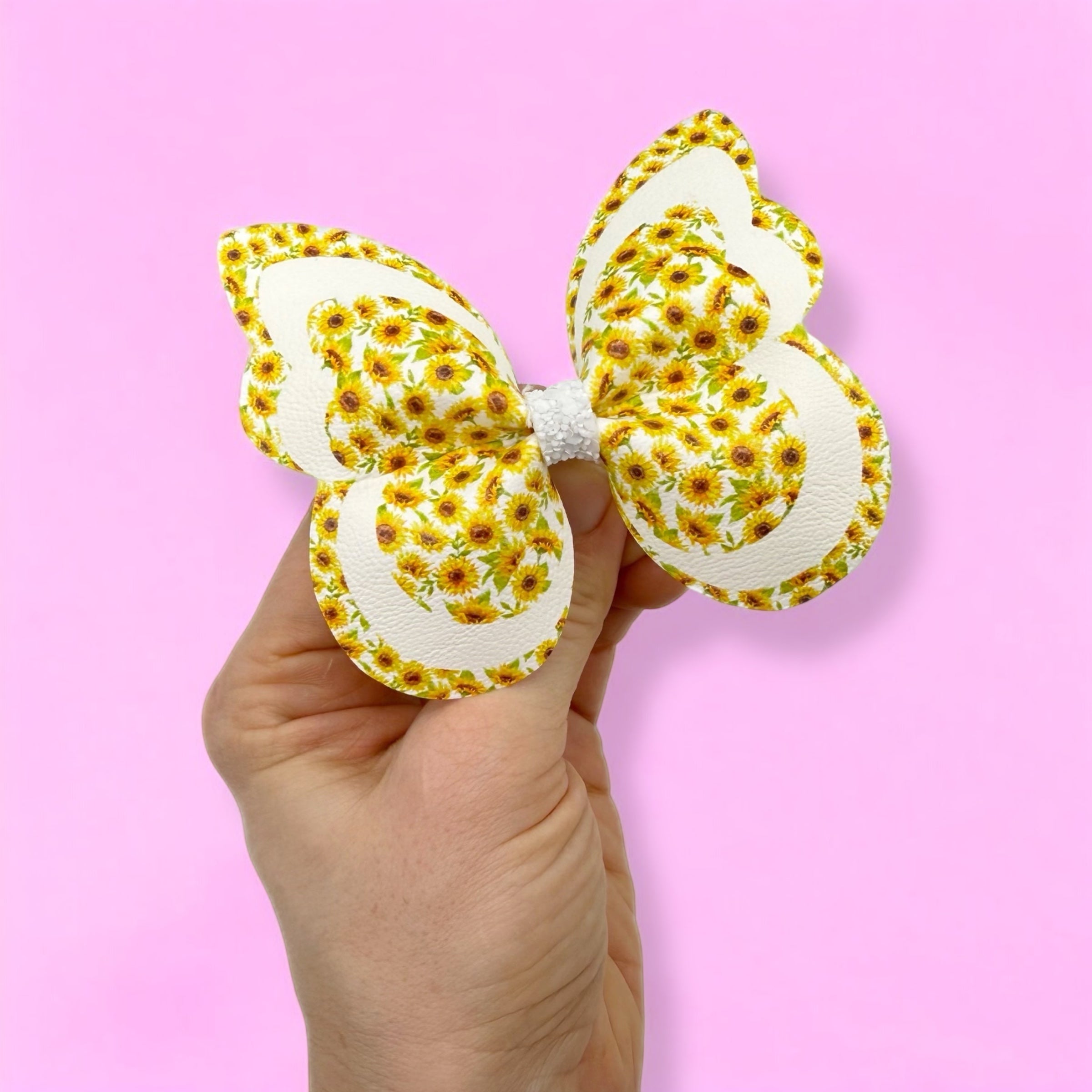 SUNFLOWER BUTTERFLY PINCH BOWS - DIY CUT OUT FAUX LEATHER FABRIC SHEETS - Eliza Henri