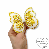 SUNFLOWER BUTTERFLY PINCH BOWS - DIY CUT OUT FAUX LEATHER FABRIC SHEETS - Eliza Henri