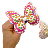 Butterfly-shaped hair bow with colourful pattern for crafting