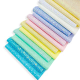 collection of pastel glitter fabric sheets for bow making