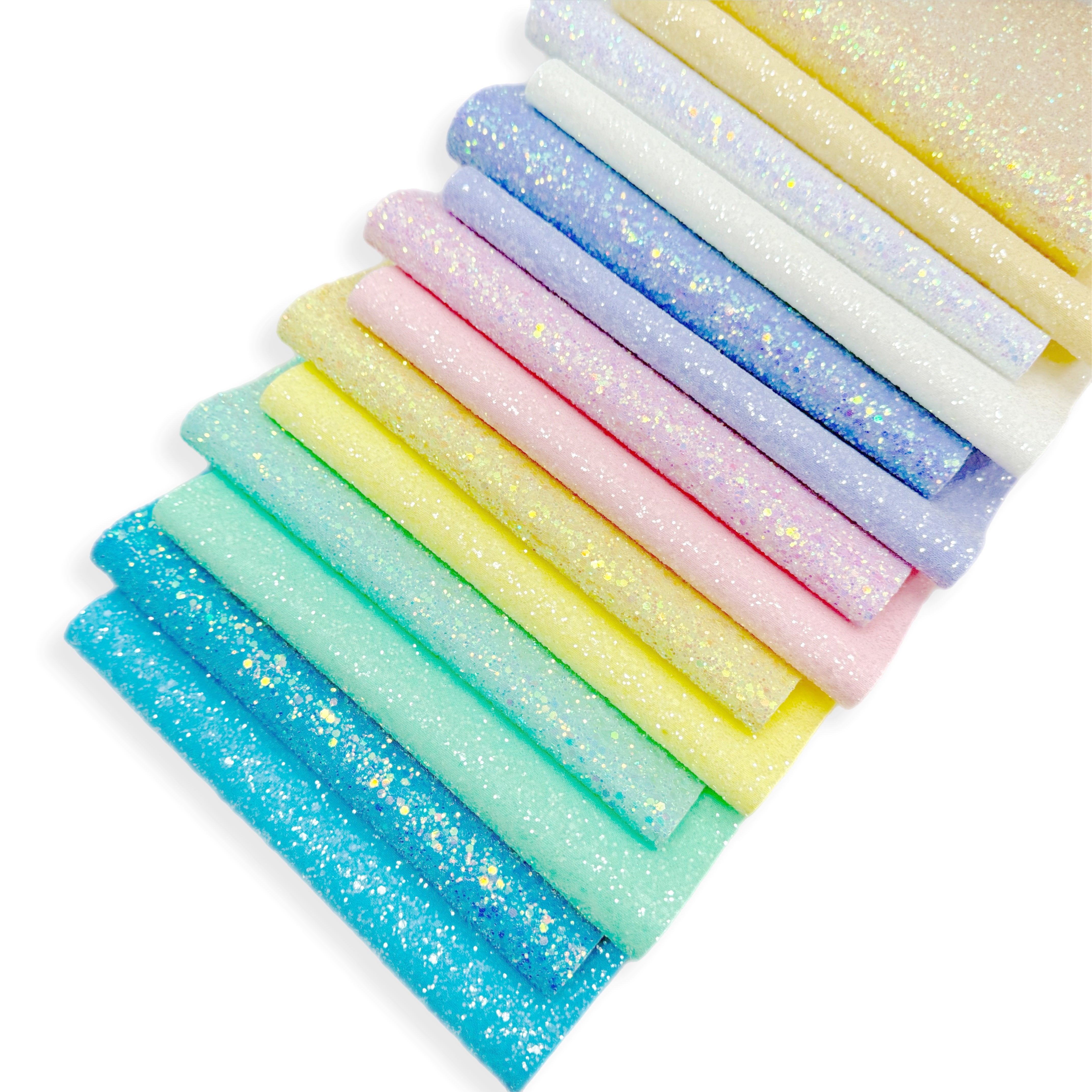 collection of pastel glitter fabric sheets for bow making