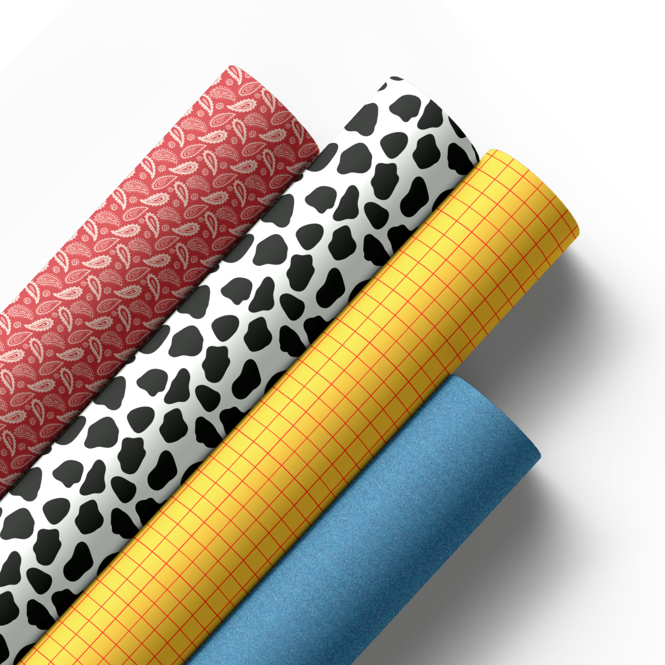 Four rolls of patterned faux leather western cowboy themed fabrics
